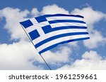Greece flag isolated on sky...