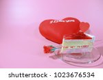 cake with rose and heart pillow ... | Shutterstock . vector #1023676534