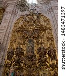 Small photo of Taxco, Mexico - May 2013 Inside Santa Prisca cathedral, there are nine floor-to-ceiling altarpieces, all covered in gold. Main altarpiece is dedicated to patron saints, Santa Prisca and San Sebastian