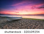 Boat And Violet Sunrise