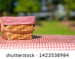 picnic basket on a table with a red tablecloth. Summer mood. relaxation. holidays