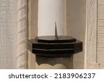 Small photo of Time clock timelapse sundial old face passing sun shadow day, from numbers roman in device for astronomy metal, timekeeping isolated. Natural spinning astrology