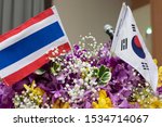 Small photo of Thailand and South Korea national flag are stand beside each other, in concept of corroboration, supportive, friendship.
