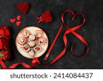 Heart made of fresh sushi rolls with roses, Valentine's Day food, traditional Japanese cuisine, banner for advertising or bar invitation, menu, space for text, top view, selective focus