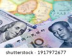 US dollar and chinese yuan on the map of Africa. Rivalry between the USA and China on the african continent, american and chinese investment, lending  economy