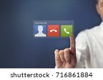 man answering phone call by... | Shutterstock . vector #716861884