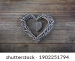 Braided heart on a wooden...