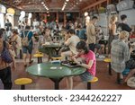 Small photo of Singapore - July 31, 2023 :Maxwell food center at night is The Maxwell Road Hawker Food Centre is well known for its affordable, tasty and huge variety of local hawker food and popular with tourist.