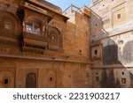 Small photo of Jaisalmer, Rajasthan, India - 15th October 2019 : Sandstone made beautiful balcony, jharokha, stone window and exterior of Rani Mahal or Rani Ka Mahal, inside Jaisalmer fort.