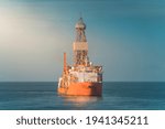 Small photo of Deep Water DP3 classed drill ship at oil field carrying out drilling operation