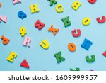 multicolored letters on a blue... | Shutterstock . vector #1609999957
