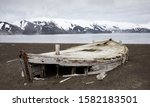 Old wooden whaling boat on the beach at Whaler