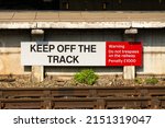 Keep Off The Track Sign Next To ...