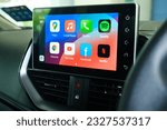 Small photo of "Rimbayu, Malaysia- July 5, 2023: Selective focus with noise effect of car Android Infotainment Player used in B Segment Sedan car."