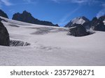 Small photo of A group of alpinists crossing the Glacier du Tour, French Alps. Crevasses in the glacier. Mount Tete Blanche at the background. Glacier Haute Route. Active tourism. Vacation in France.