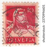 Small photo of SWITZERLAND - 1914: 10 centimes red on buff postage stamp depicting portrait of William (Wilhelm) Tell, a folk hero of Switzerland. He was an expert marksman, father of the Swiss Confederacy