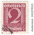 Small photo of AUSTRIA - 1925: 2 groschen claret postage stamp depicting Numeral of Value and a geometric ornament