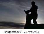 silhouette of a child standing... | Shutterstock . vector #737960911