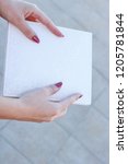 white book in hand | Shutterstock . vector #1205781844
