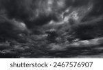 Dark dramatic sky with black...