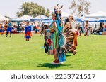 Small photo of Malibu, California, USA - April 9, 2022. Powwow. Native Americans men dancing. Chumash Day Powwow and Intertribal Gathering.