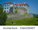 Small photo of Castle of Prem, close to Ilirska Bistrica in Slovenia, rising on a green hill on a sunny day. Less known castle in slovenia, but on a good vantage point.