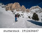 Ski touring in Dolomites, Italy. Skialpinism, touring on skis in winter wonderland of South Tyrol, Dolomites, Italy. Alto Adige, Gardena Pass.