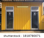 Small photo of Toilet Modular Knock Down with Yellow Metal Sheet Wall ,Selective Focus.