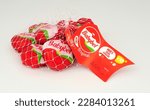 Small photo of Stockport, United Kingdom, March, 22nd, 2023, Babybel mini Edam snack cheese wrapped in red wax