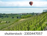hot-air balloon over lake Balaton in Hungary .
