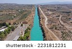 Aerial drone photo of narrow Corinth canal of Isthmus from West submersible bridge and narrow opening of Corinthian gulf to Saronic gulf, Loutraki, Greece