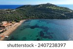 Small photo of Aerial drone photo of iconic archaeological site of Cape Sounio and famous Temple of Poseidon built uphill overlooking Aegean sea, Attica, Greece