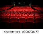 Close up of generic red theater seats with balcony