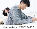 Small photo of high school student studying at cram school