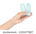 hand holding small plastic... | Shutterstock . vector #1192477807