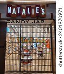 Small photo of Seattle, WA, USA - December 15th 2023: Closed candy store Natalie's Candy Jar at Seattle Airport