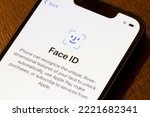 Small photo of Portland, OR, USA - Sep 3, 2022: Face ID introduction page is seen on an iPhone.