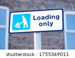 No goods vehicles loading at any time road sign