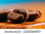 Small photo of Coffee bean in macro view. Coffee bean closeup. Coffee bean macro. Coffee bean
