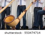 Small photo of Alphorn or alpenhorn a wooden swiss traditional music instrument