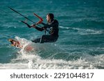 Small photo of Kitesurfing. Surfers of all ages train in the Mediterranean. Israel, Ashkelon, January 2023 Training continues. Sport, health, recreation concept