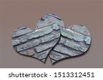 Small photo of close up of two flinty hearts, isolated on brown and gray background with gradient