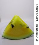 stock-photo-piece-of-fresh-yellow-watermelon-doll-hybrid-unique-tropical-healthy-fruit-with-bright-flesh-has-1390652897.jpg