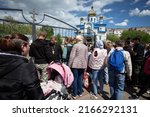Small photo of People stand in line at the church for humanitarian aid after the city was liberated from Russian occupation in Borodianka, Ukraine. May 28, 2022.
