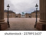 Small photo of Copenhagen, Denmark - 02.07.2020: Amalienborg Square with the equestrian statue of the King Frederick V of Denmark