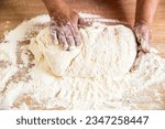 Small photo of Making dough by male hands at bakery. Food concept. Hands dough. Female hands making dough for pizza. Preparation doughs. Preparation doughs women's hands.