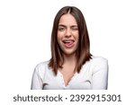 Small photo of Portrait of funny girl with showing tongue winking with one eye, making faces, fooling around. Funky flirty young woman lick teeth tongue wink eye smile. Shows tongue and winks.