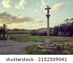 Small photo of Stone cross in Muxia on the Camino de Santiago, Galicia, Spain. These symbols were built from the seventeenth century to sanctify the roads and pilgrims.