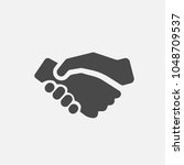 handshake vector icon  | Shutterstock .eps vector #1048709537