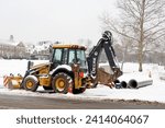 Small photo of Doylestown,PAUSA January 16,2024. A construction site on a snowy winter day. Nobody is working.